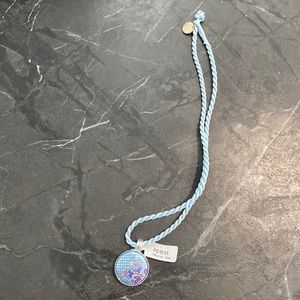 Blue satin necklace with silver pendant
